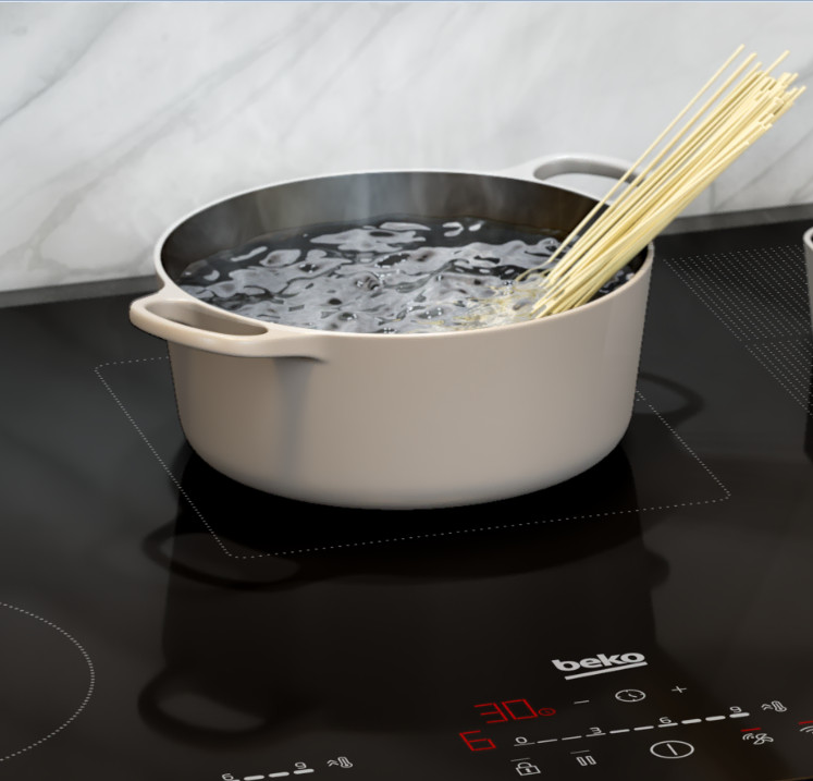 Spaghetti gotowane w garnku wrzącej wody na czarnej kuchence. Kuchenka wyświetla timer i logo beko.