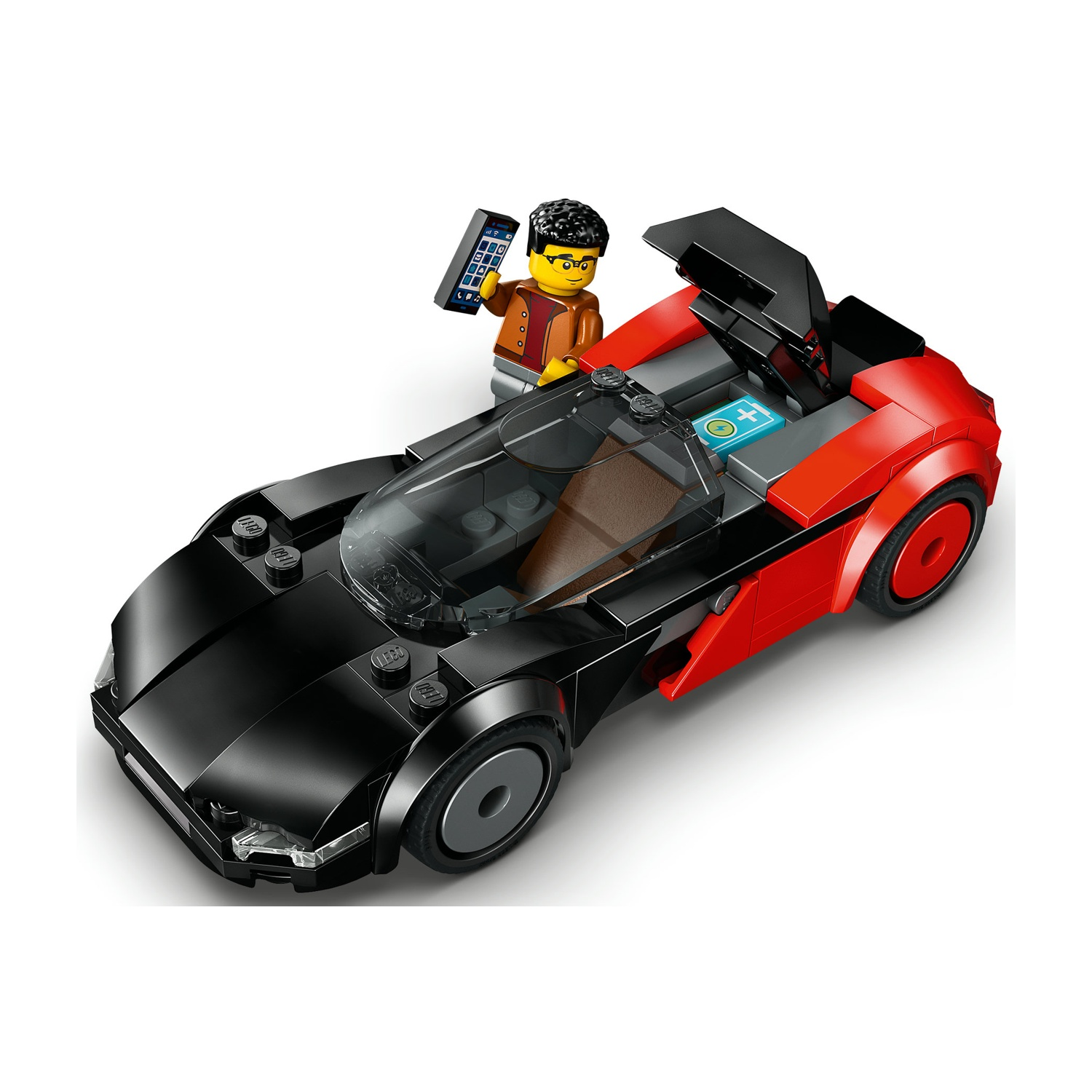 Un'auto sportiva Lego nera e rossa con portiere ad ali di gabbiano. Una minifigure con un telefono è in piedi accanto all'auto. Sfondo bianco.