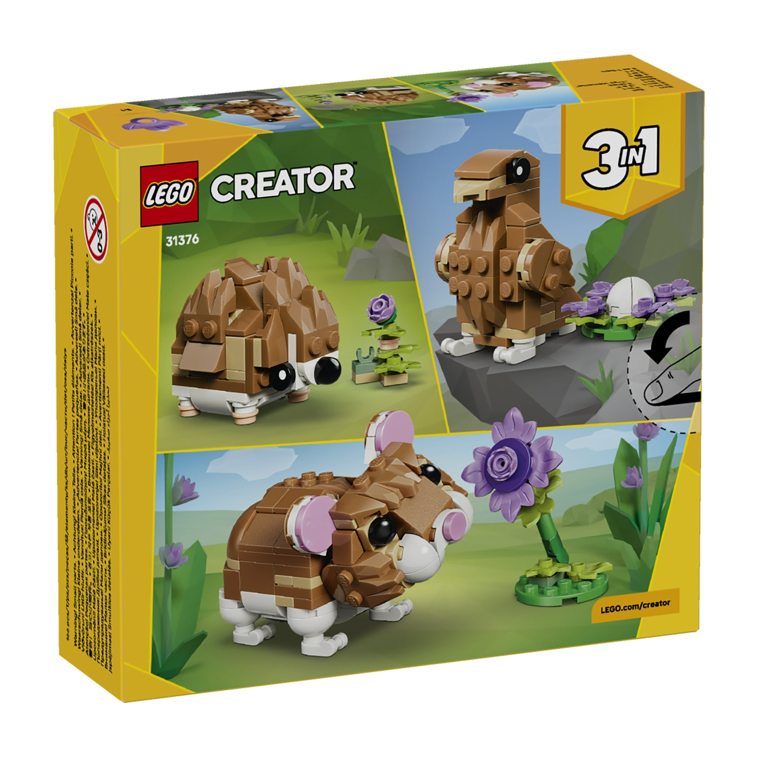Scatola Lego Creator, 3 in 1. Include modelli di animali Lego: criceto, uccello e topo. I colori marrone, bianco e viola dominano.