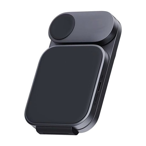 Sötétszürke, összecsukható telefontöltő. Van egy kör alakú párnája, egy téglalap alakú párnája és egy USB portja. A háttér fehér.