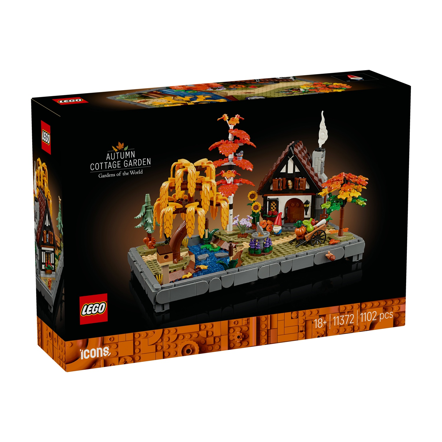 Scatola Lego di un set di giardino di cottage autunnale. Presenta un cottage, alberi dai colori autunnali e un piccolo giardino con zucche.