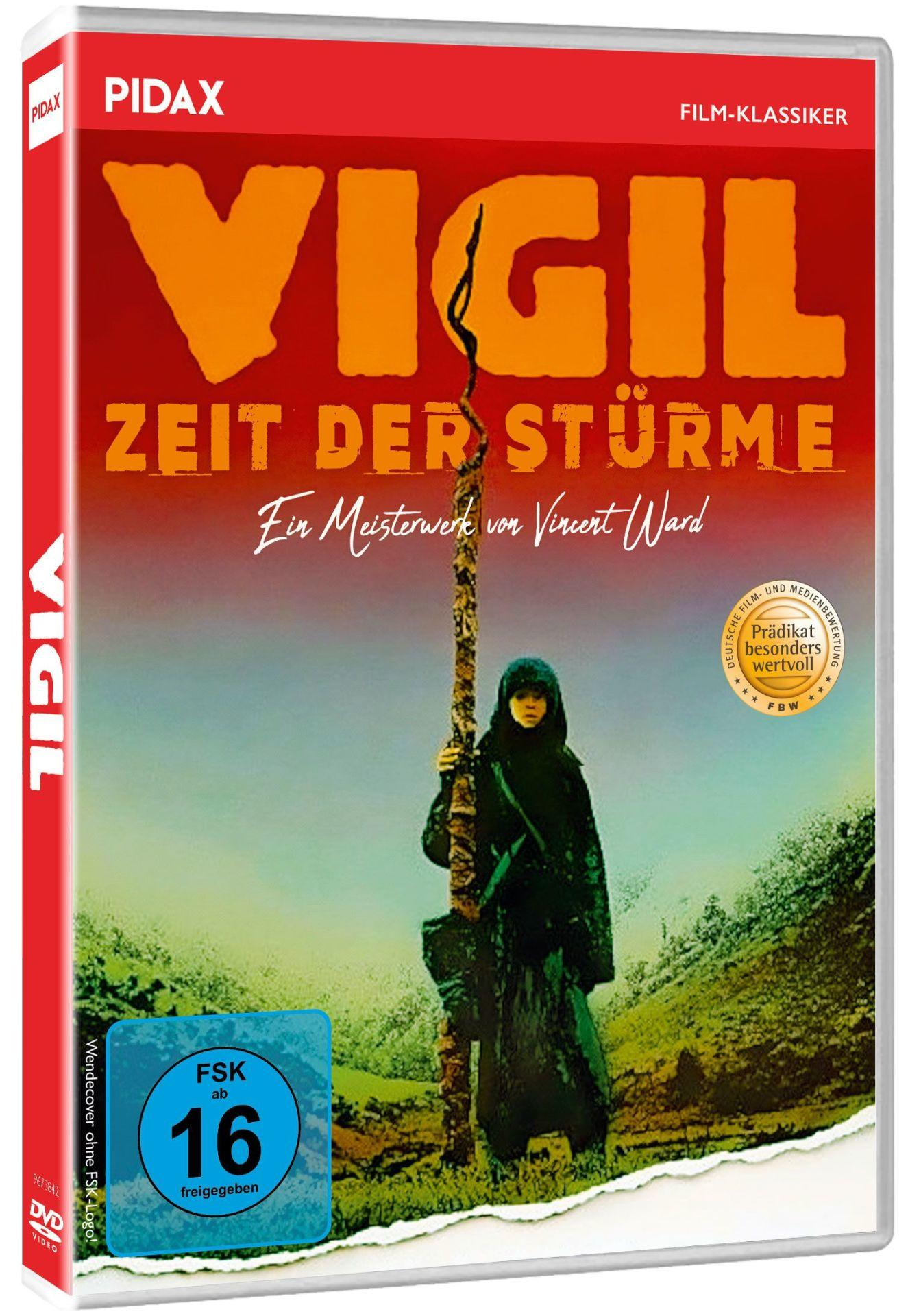 DVD-Cover für 'Vigil'. Eine Person in dunkler Kleidung hält einen Stock auf einem Hügel. Titeltext ist orange.