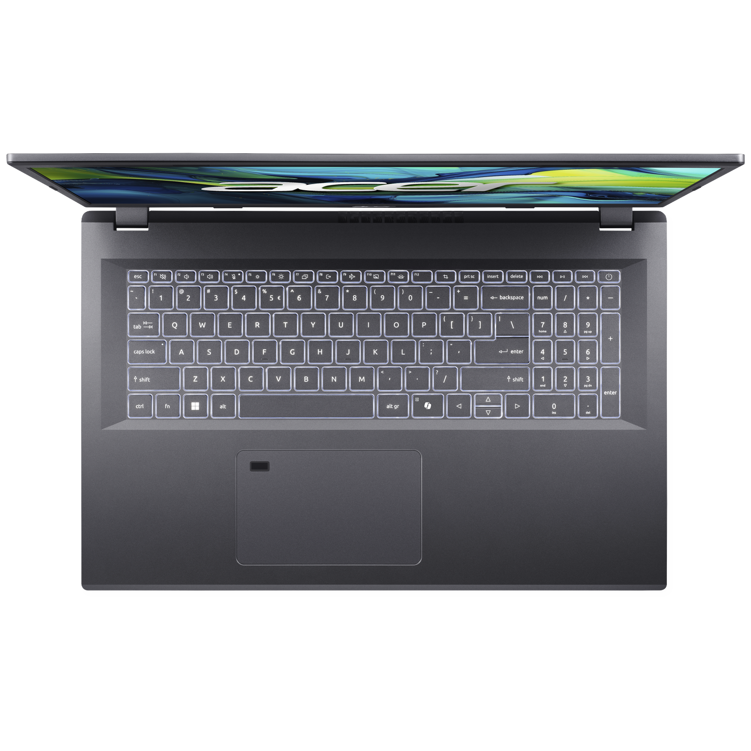 An open, gray laptop on a white surface. The keyboard is lit. The screen shows a reflection.