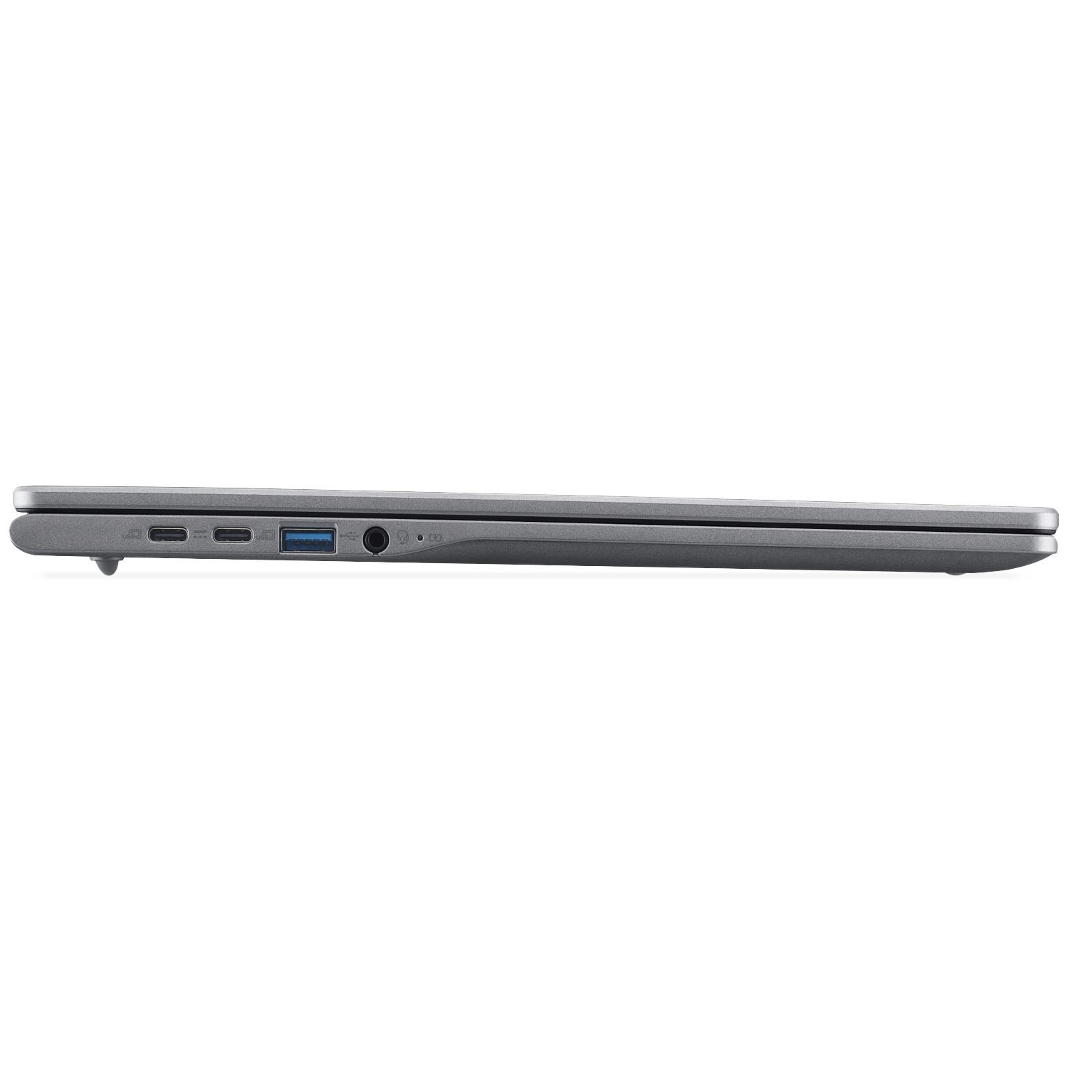 Side view of a gray laptop. Visible ports include USB, headphone jack, and other small ports. The laptop is on a white surface.