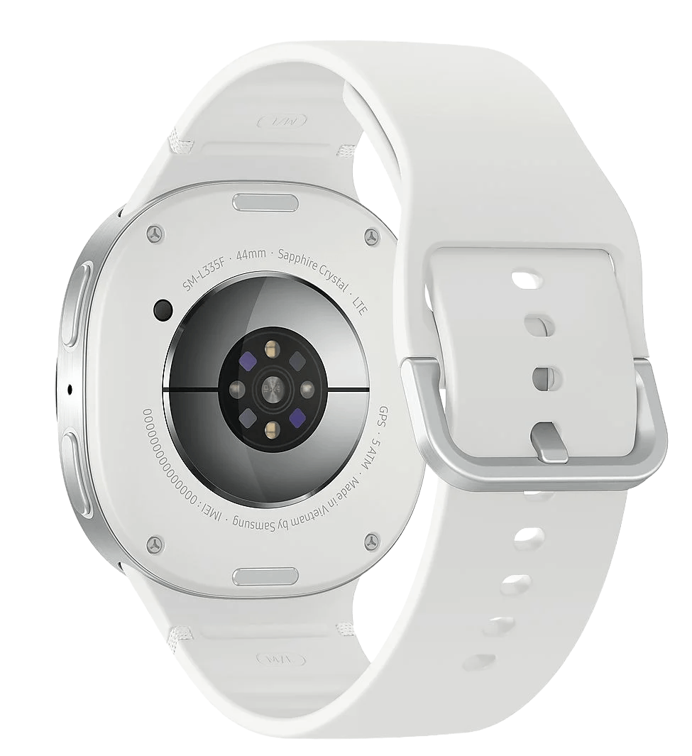 Parte trasera de un reloj inteligente blanco, mostrando sensores y correa. Incluye texto: GPS, Samsung e info del modelo. Correa blanca con cierre plateado.