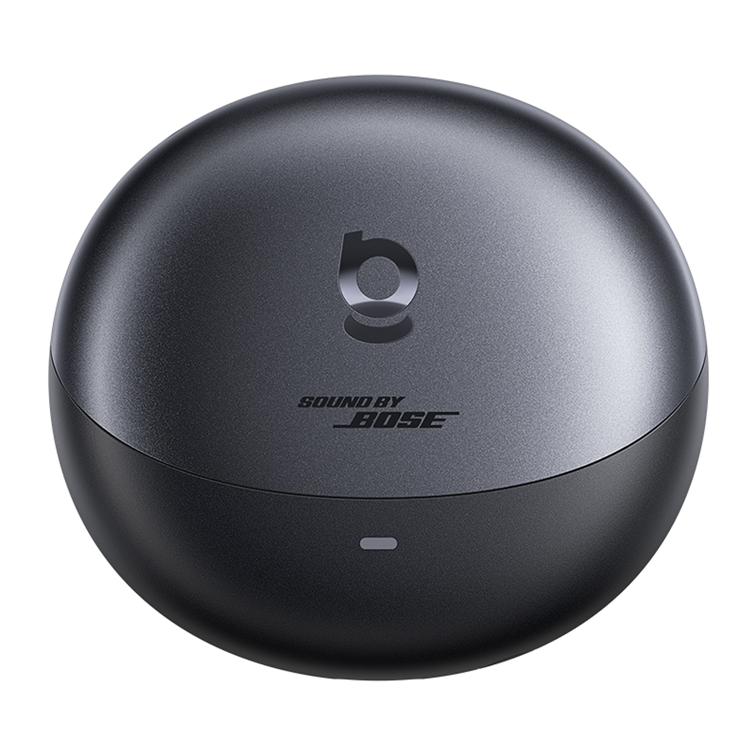 Un estuche de carga Bose Sound by Bose gris oscuro y redondo. El estuche tiene un logotipo en la parte superior y una pequeña luz en la parte inferior.