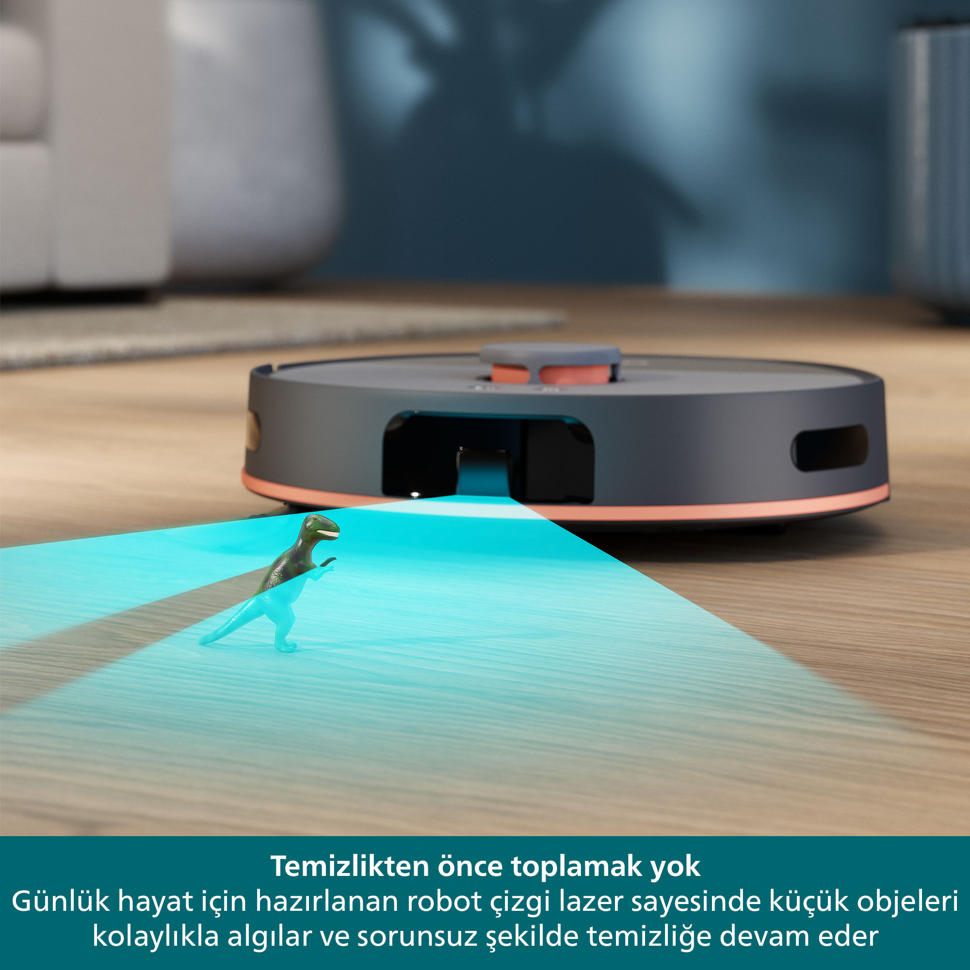 Oyuncak bir dinozorla bir robot süpürge. Zemini mavi bir ışıkla tarıyor.