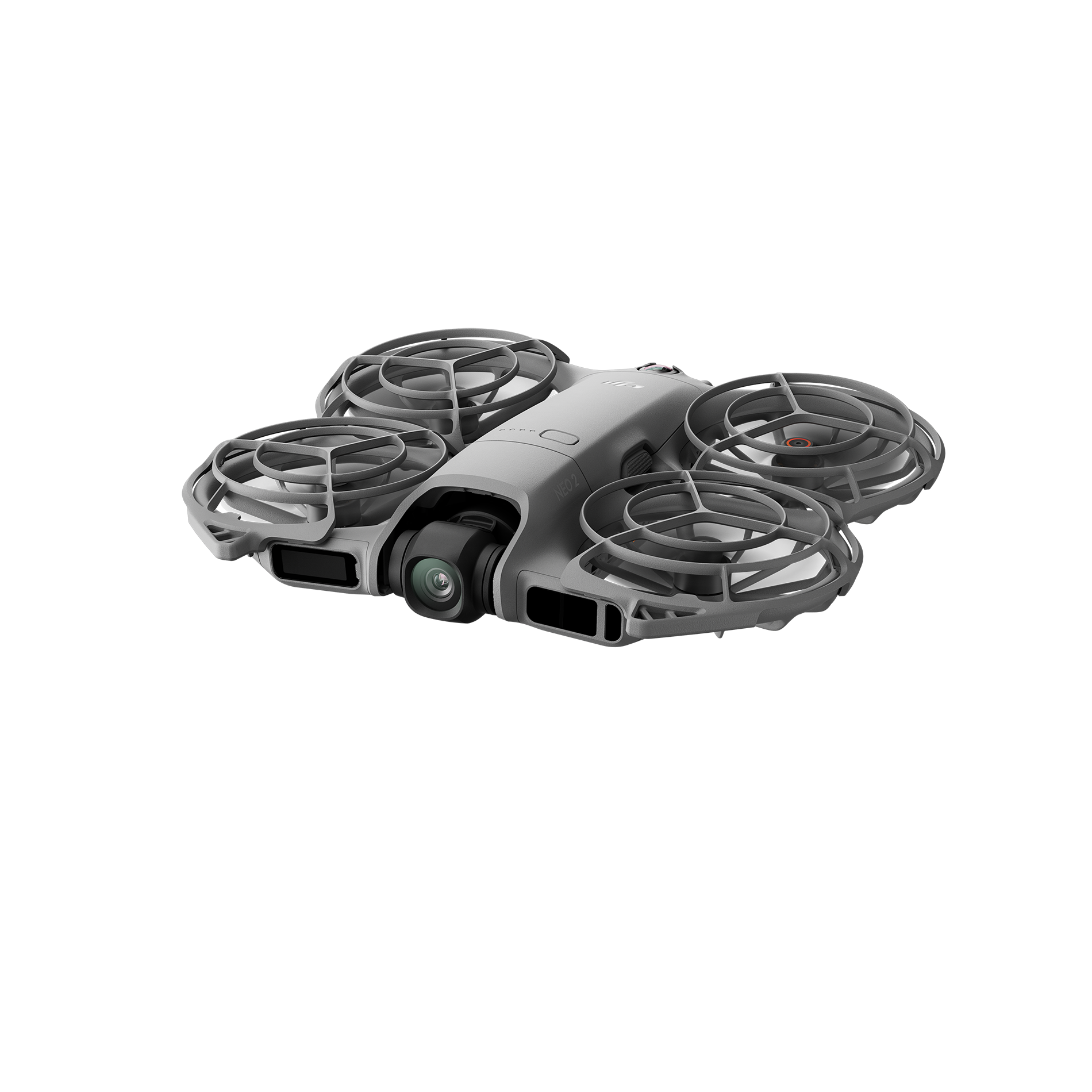 Dört pervaneli, koruyucularla çevrili gri bir drone, desenli bir yüzeyde duruyor. Bir kamera görülebilir.