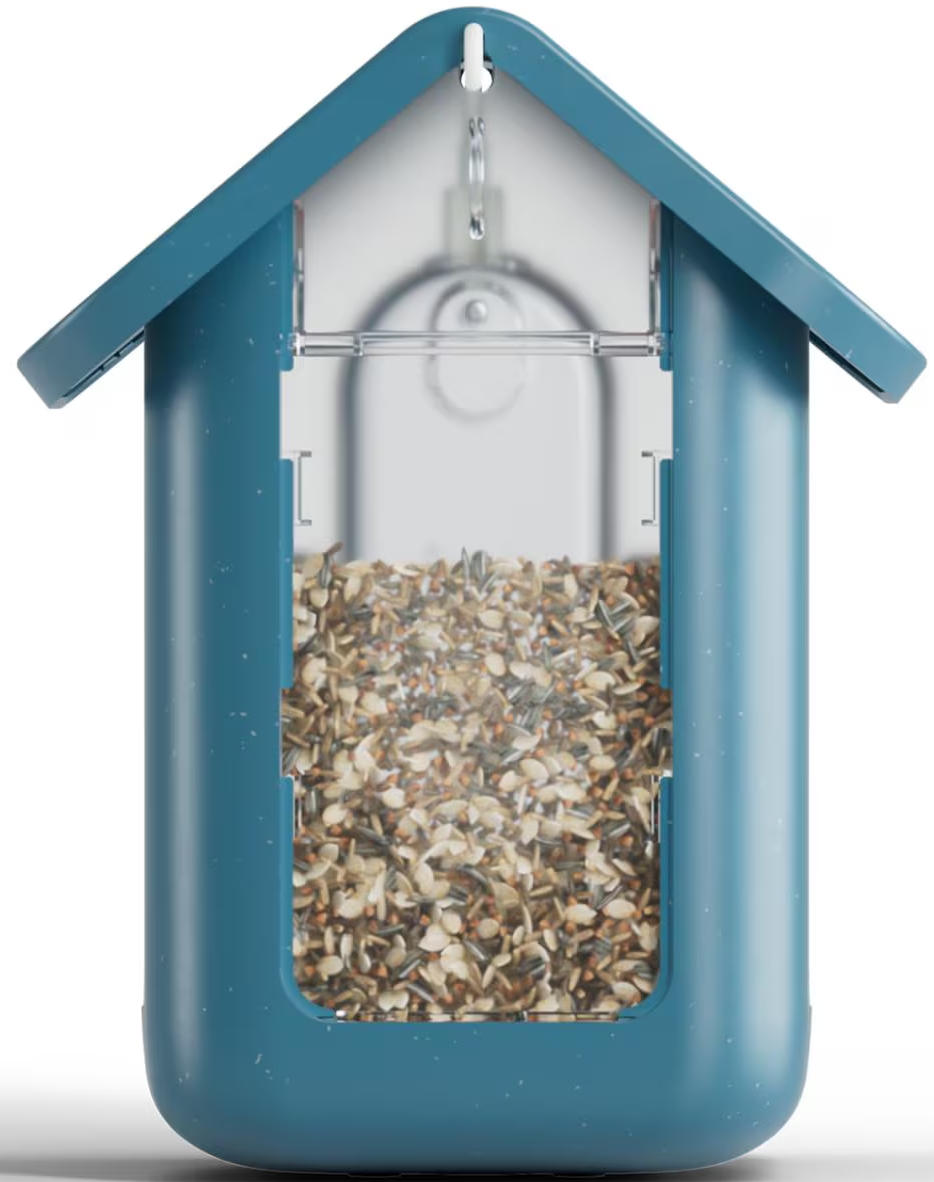 Mangiatoia per uccelli a forma di casa, blu acqua, piena di semi. Fronte in plastica trasparente. Gancio superiore.