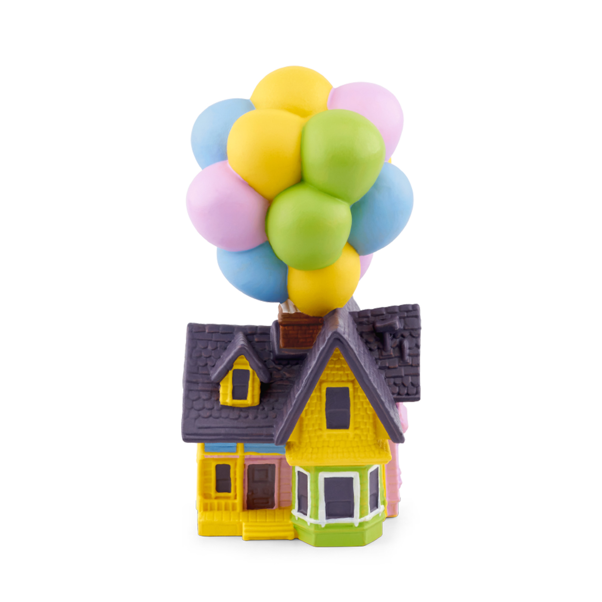 Ein Spielzeughaus mit bunten Ballons, das nach oben schwebt. Das Haus ist gelb und rosa mit einem dunklen Dach.