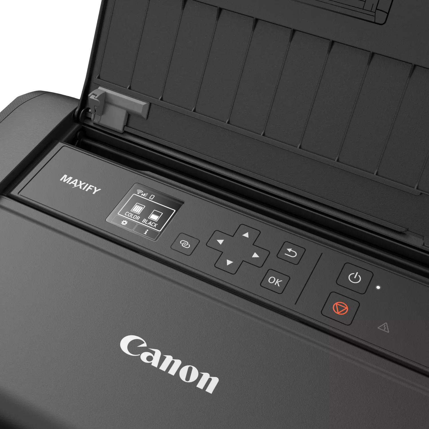 Una impresora Canon Maxify negra está abierta, mostrando el panel de control con una pequeña pantalla y botones, incluyendo encendido y OK.