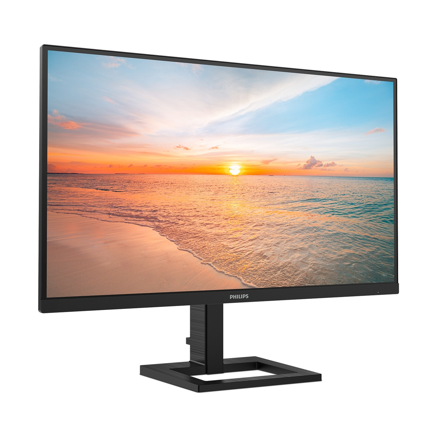 Un monitor nero per computer mostra una scena di spiaggia con un tramonto. Il monitor ha un supporto nero e un logo Philips.