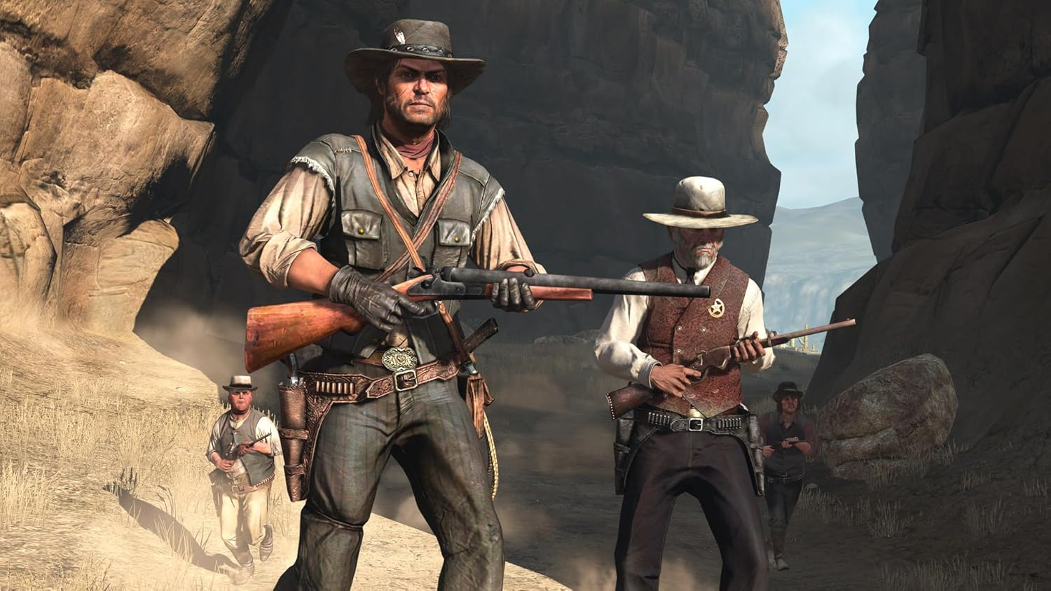Vaqueros en un cañón desértico, armados con rifles. Dos al frente, otros al fondo, todos con sombreros y chalecos.