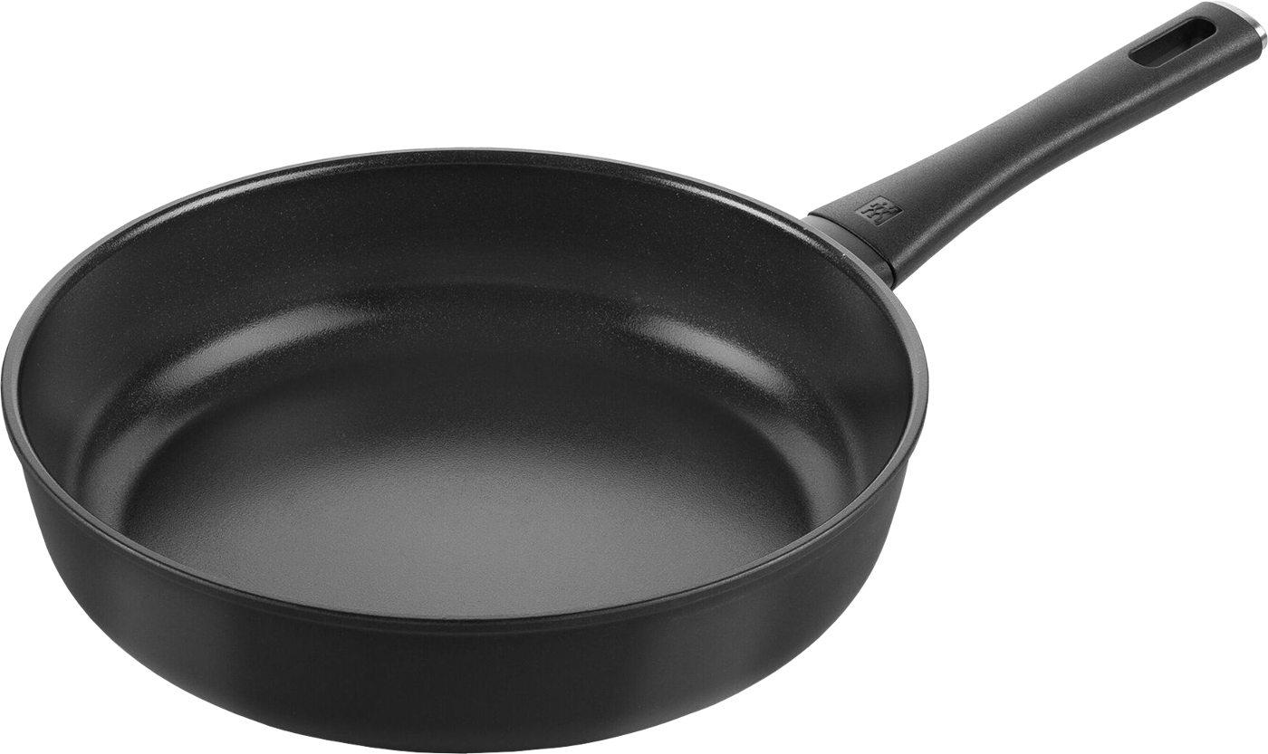 Eine schwarze Bratpfanne mit langem Griff, isoliert auf schwarzem Hintergrund. Die Pfanne ist rund und hat eine Antihaftbeschichtung.