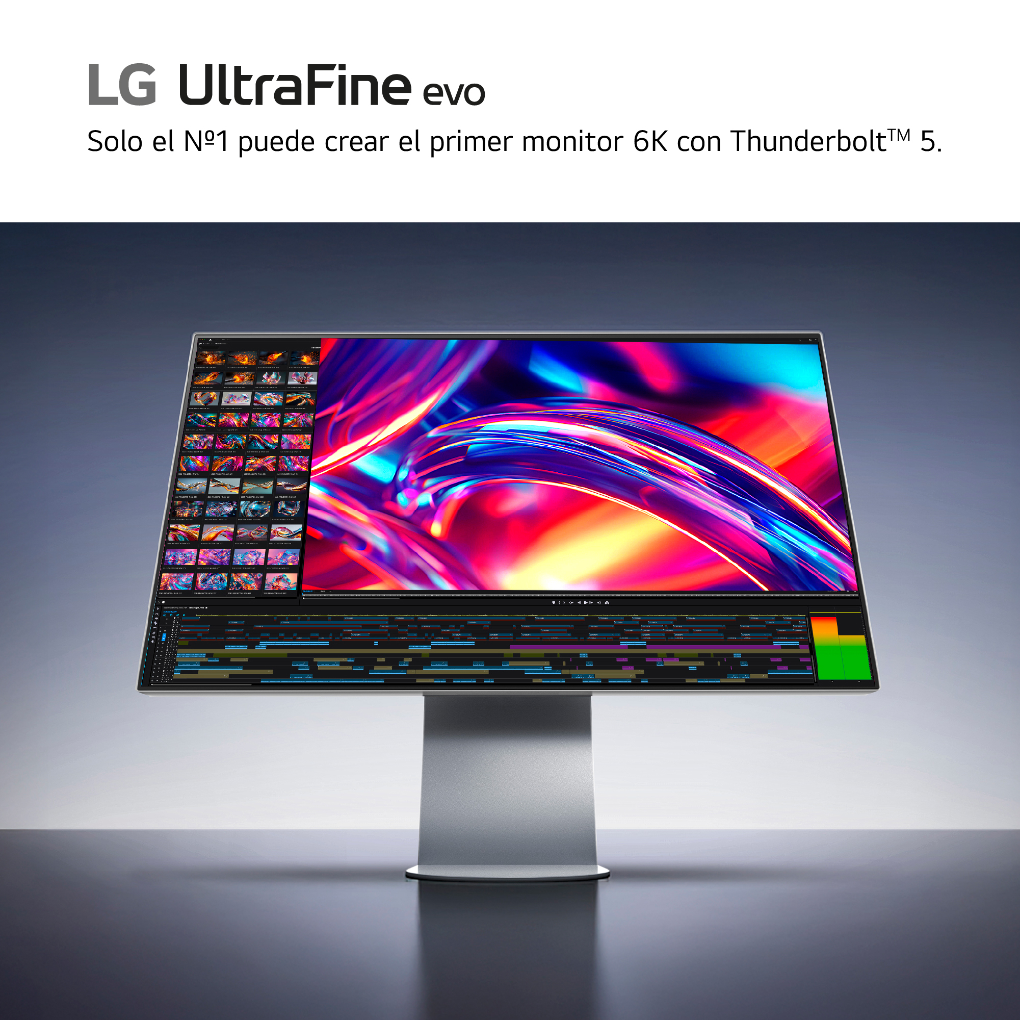 Monitor LG UltraFine evo muestra imagen abstracta. Está sobre soporte plateado y fondo azul degradado.