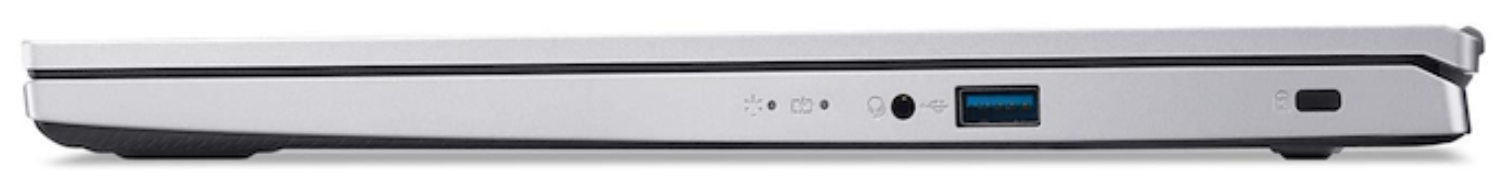 Vista lateral de un portátil plateado. Los puertos visibles incluyen USB, conector de audio y botón de encendido. El portátil está cerrado.