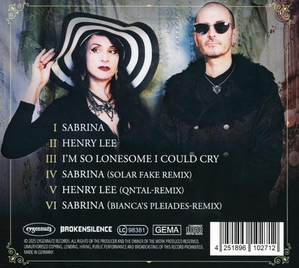 Albumcover mit zwei Personen. Eine Frau mit Hut und ein Mann mit Sonnenbrille sind auf dem Cover.