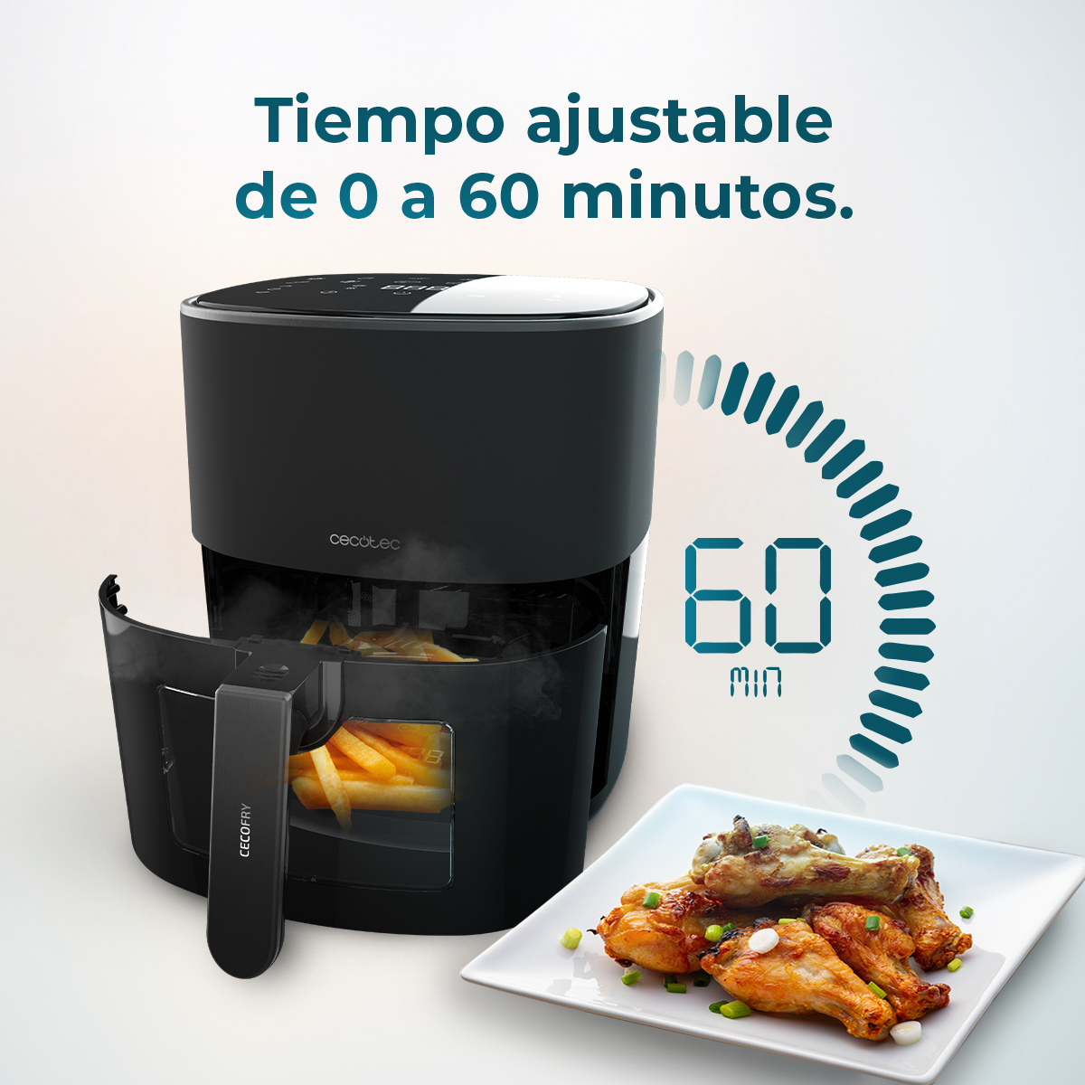Freidora de aire negra con papas fritas y alitas de pollo en un plato. El temporizador muestra 60 minutos. Texto: 'Tiempo ajustable de 0 a 60 minutos'.