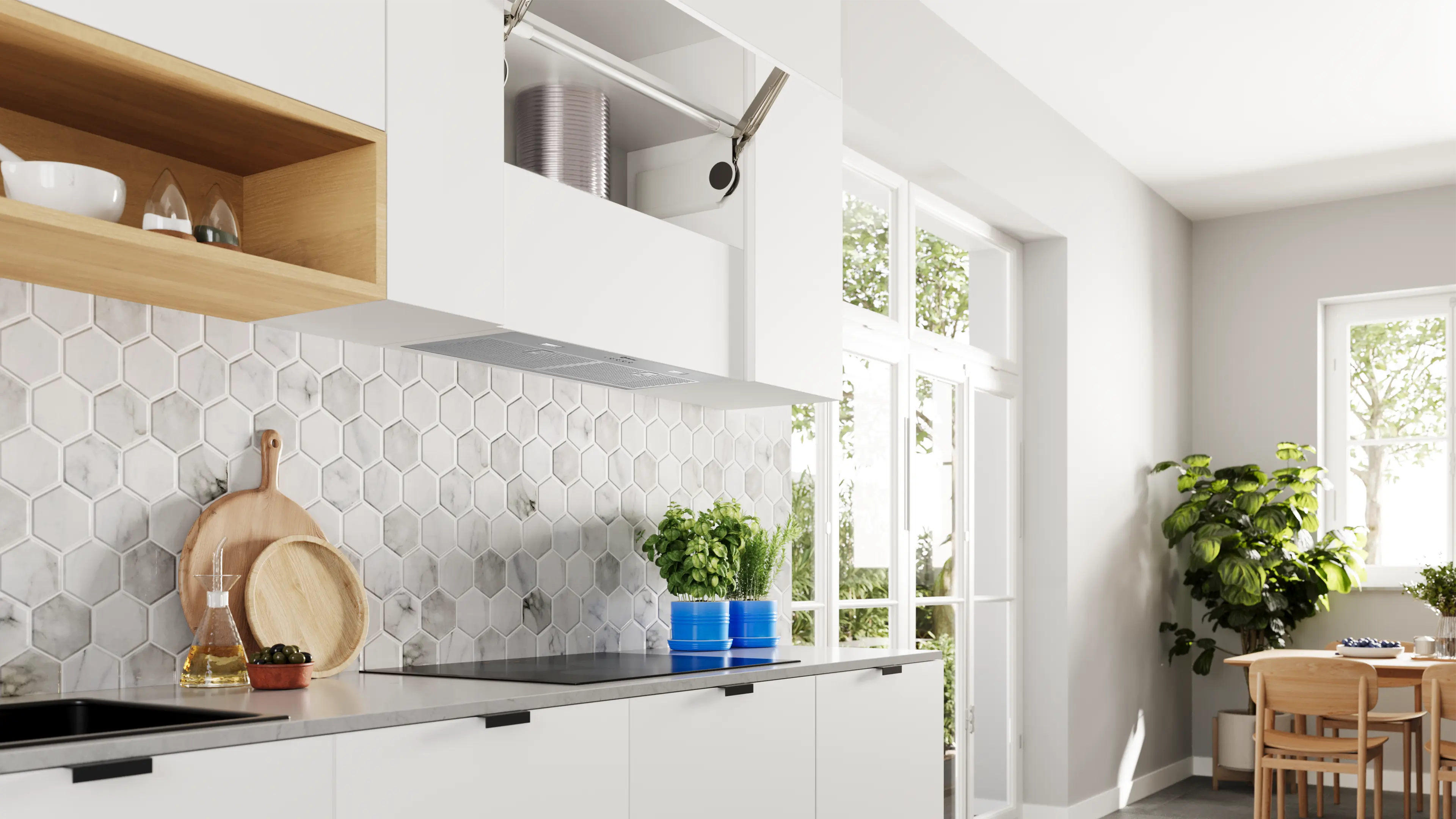 Cocina moderna con gabinetes blancos, salpicadero de baldosas hexagonales y plantas. Incluye una estantería de madera, tablas de cortar y una placa de inducción.