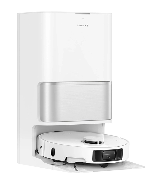 Biały robot sprzątający Dreame w białej stacji ładującej. Stacja posiada metaliczną, srebrną sekcję.