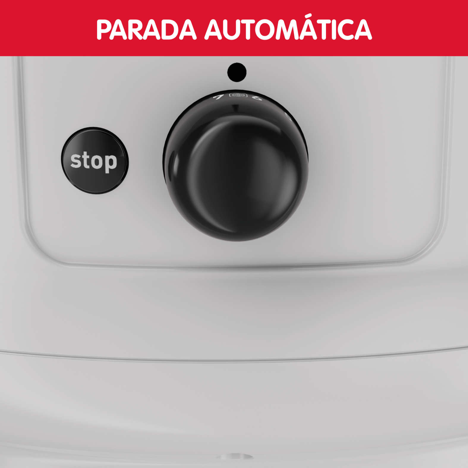 Primer plano de un electrodoméstico blanco con una perilla negra, un botón de parada y las palabras 'PARADA AUTOMÁTICA' en rojo.