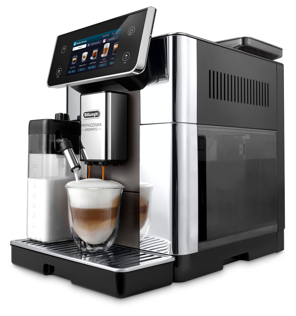 DeLonghi PrimaDonna kávéfőző. Espressót öntenek egy pohárba. A tej habzik. A digitális kijelző kávé opciókat mutat.