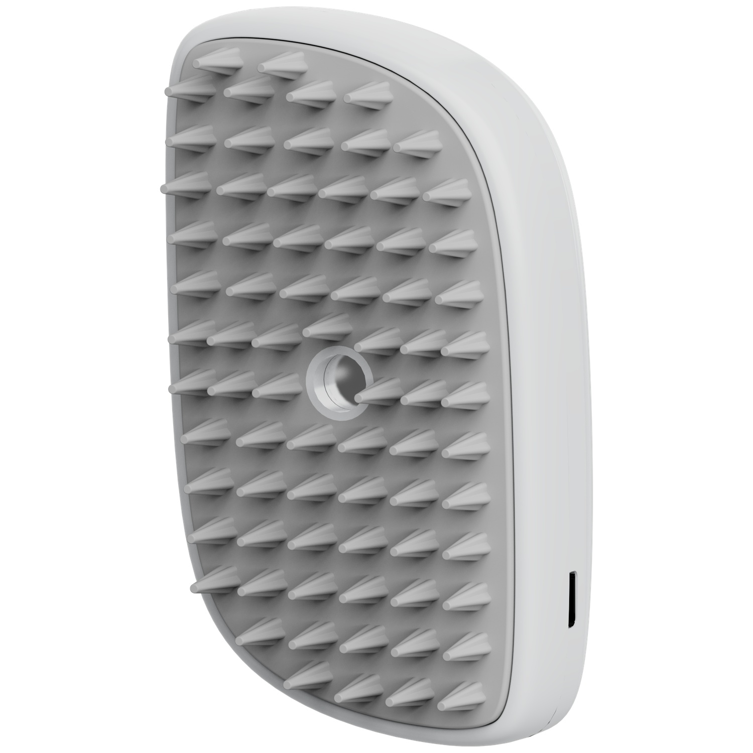 A white and grey massage tool. It has a rounded rectangular shape with grey cone-shaped protrusions and a small hole.