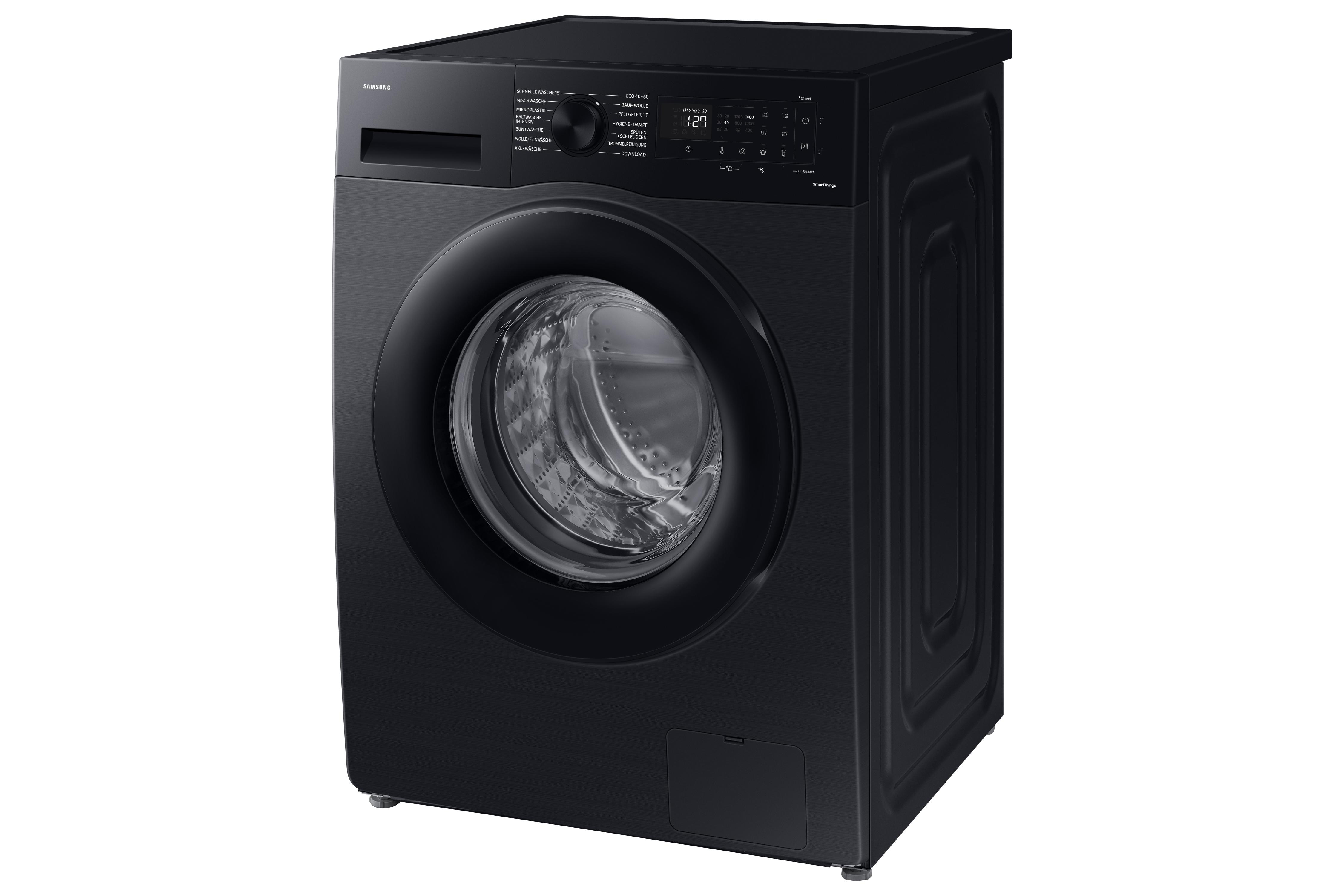 Eine schwarze Samsung Waschmaschine. Sie hat eine runde Tür und ein Digitaldisplay.