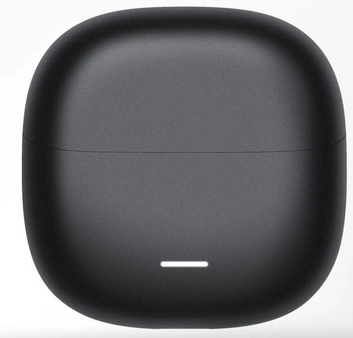 Zbliżenie czarnego, zaokrąglonego etui ładującego słuchawki. Cienka biała linia wskazuje stan ładowania. Etui znajduje się na białym tle.