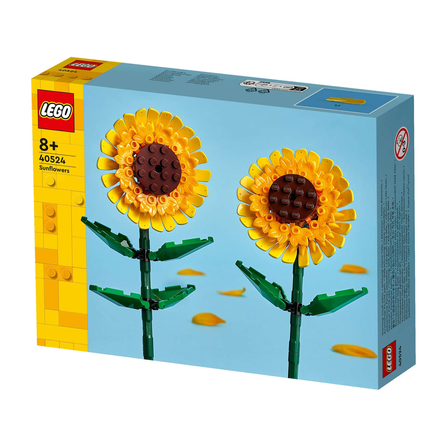 Scatola di Lego girasoli. Due girasoli gialli con steli e foglie verdi, su sfondo blu.