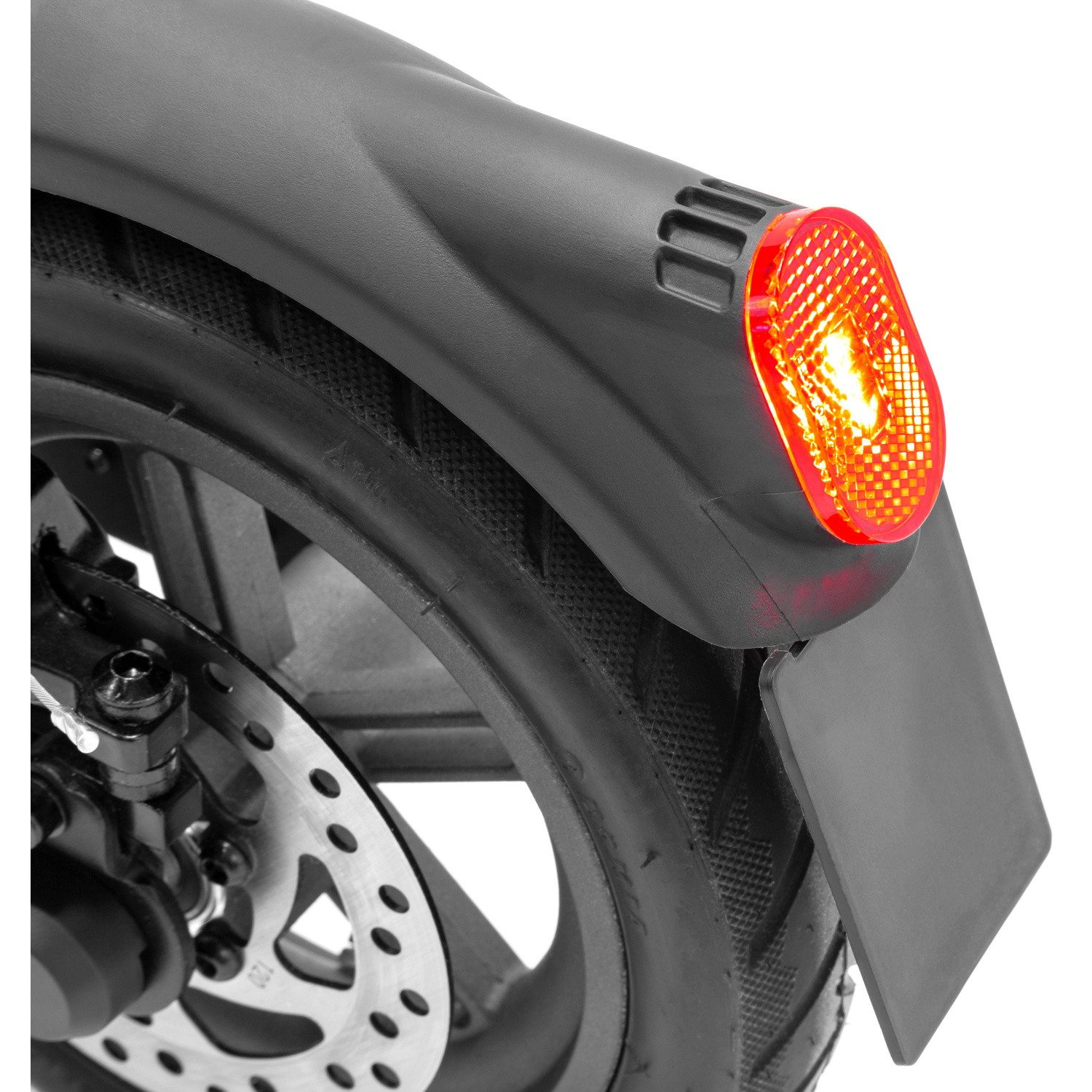 Close-up of e-scooter rear wheel. Black tire, disc brake, and red reflector. The fender is dark gray.