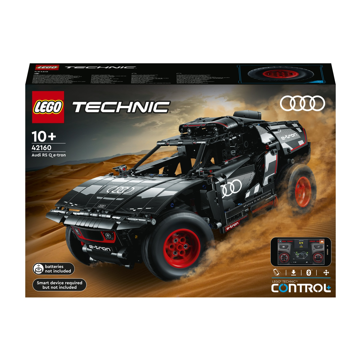 Un set Lego Technic Audi RS Q e-tron. Auto nera con ruote rosse. Include un'interfaccia di controllo su un telefono. Lo sfondo è sabbioso.