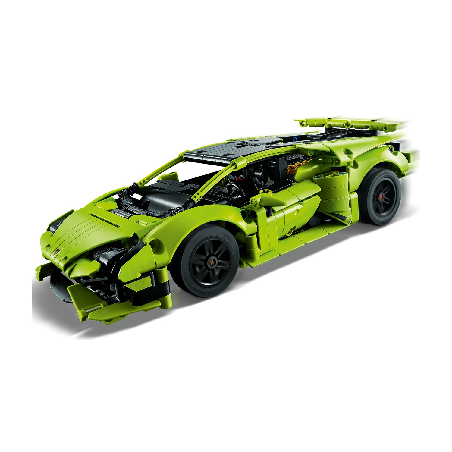 Un modello di auto sportiva Lego verde con ruote nere, su sfondo bianco.