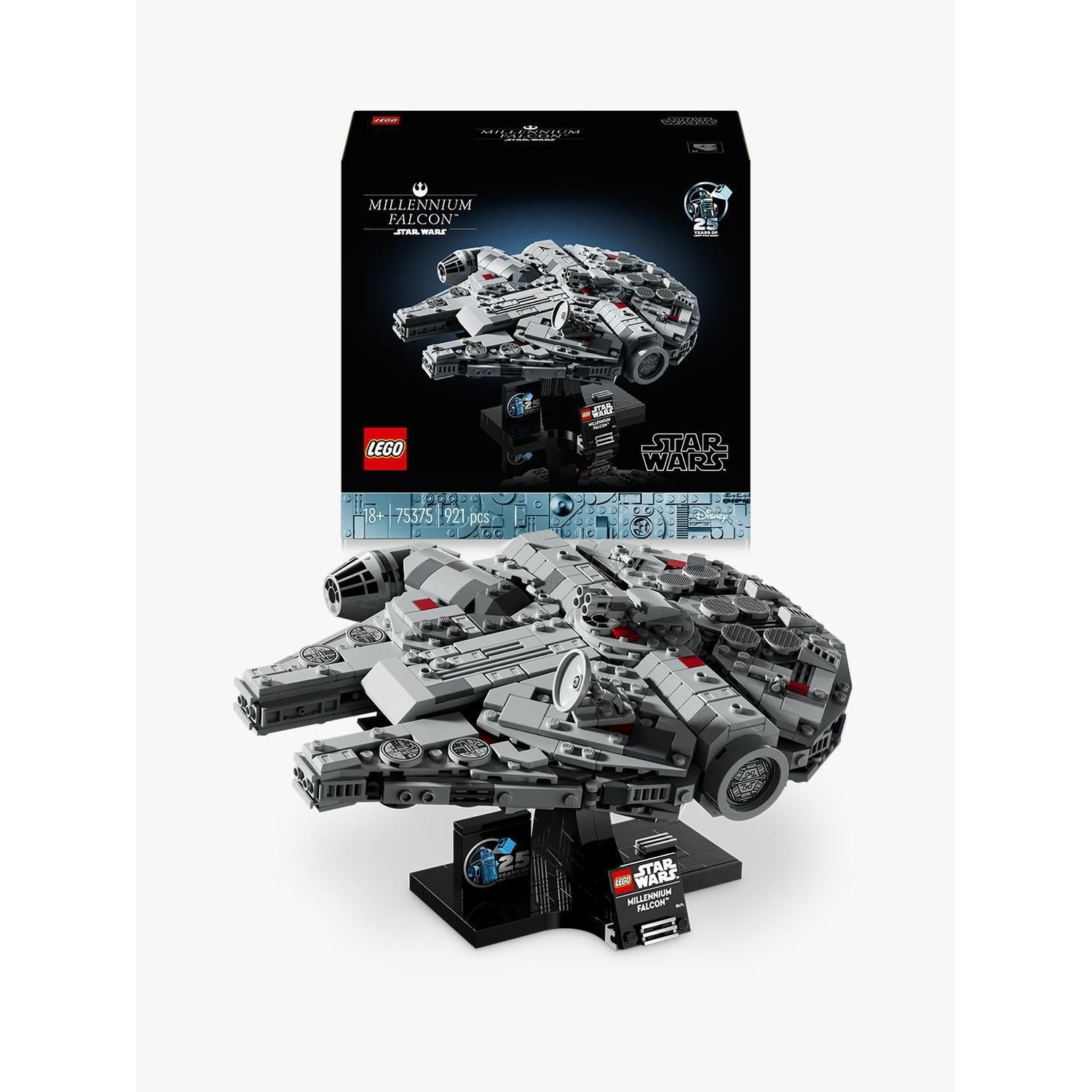 Un set Lego Millennium Falcon. Il modello è grigio e nero, su un supporto nero. La scatola è sullo sfondo.