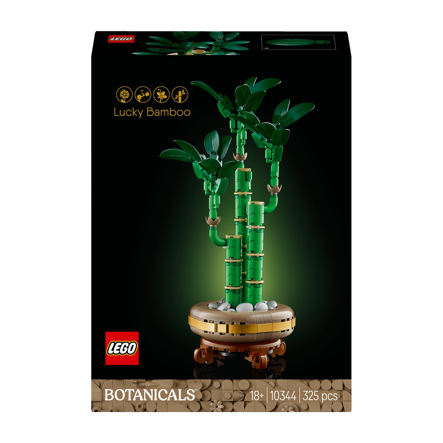 Una scatola Lego mostra una pianta di bambù della fortuna fatta di mattoncini Lego, posta in un vaso marrone. Lo sfondo è verde scuro.