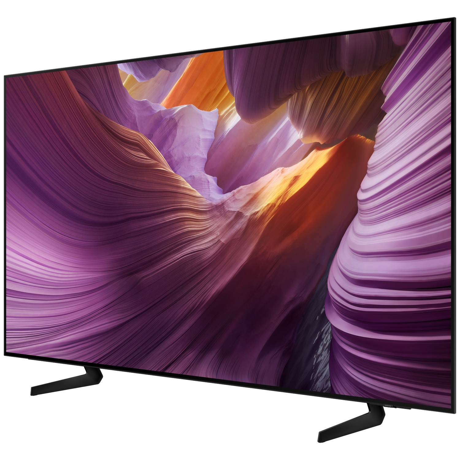 Een grote, moderne tv met een kleurrijk abstract beeld op het scherm, ondersteund door twee zwarte standaards.