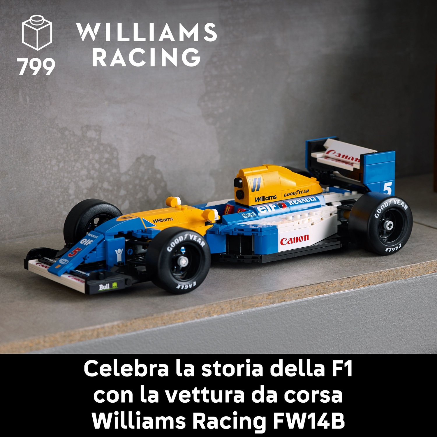 Un modello Lego di auto F1, blu e giallo, su uno scaffale. L'auto ha loghi di sponsor, il numero 5 e pneumatici 'Goodyear'.