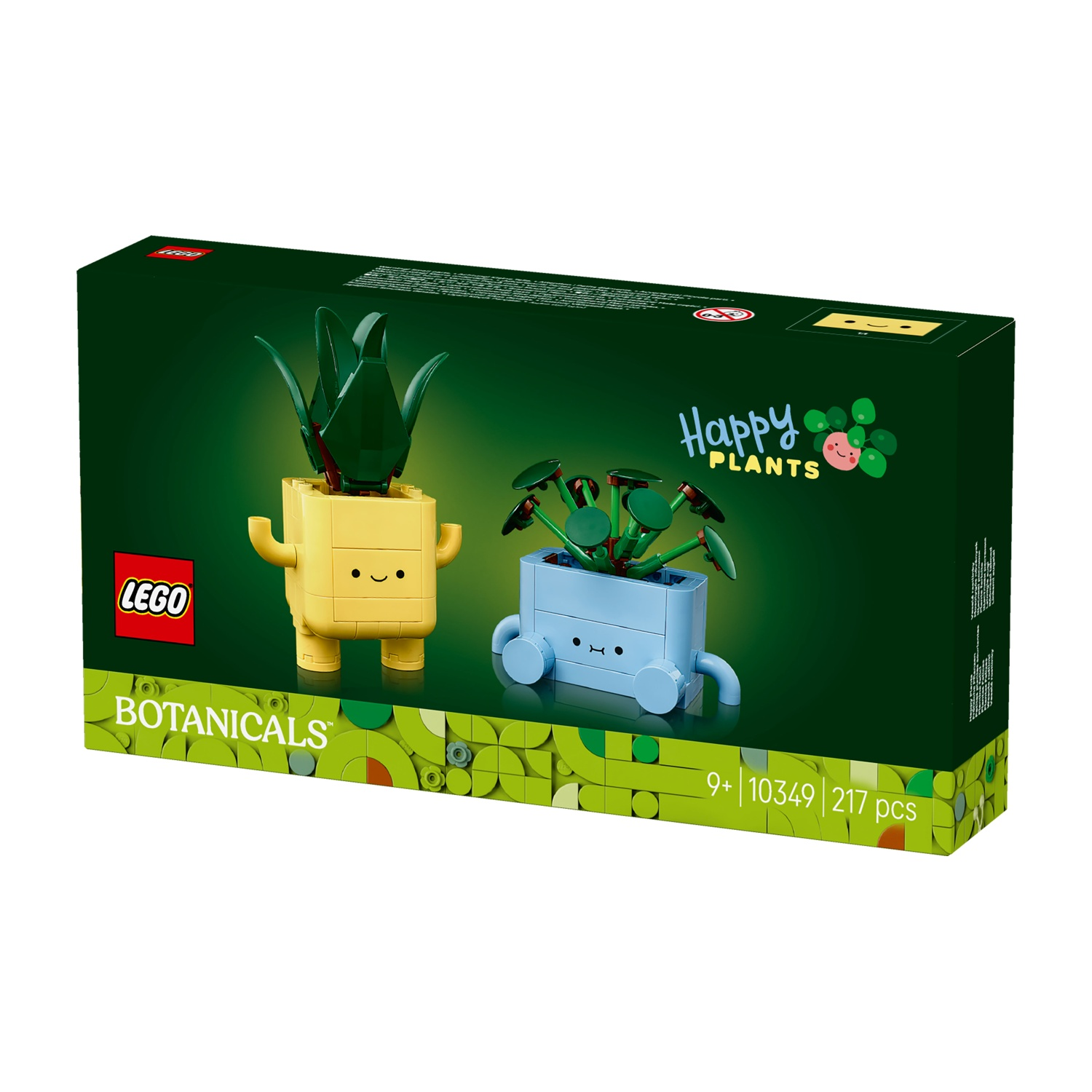 Una scatola Lego mostra due modelli di piante. Uno è giallo con foglie verdi e l'altro è blu con foglie verdi. La scatola dice "Happy Plants".