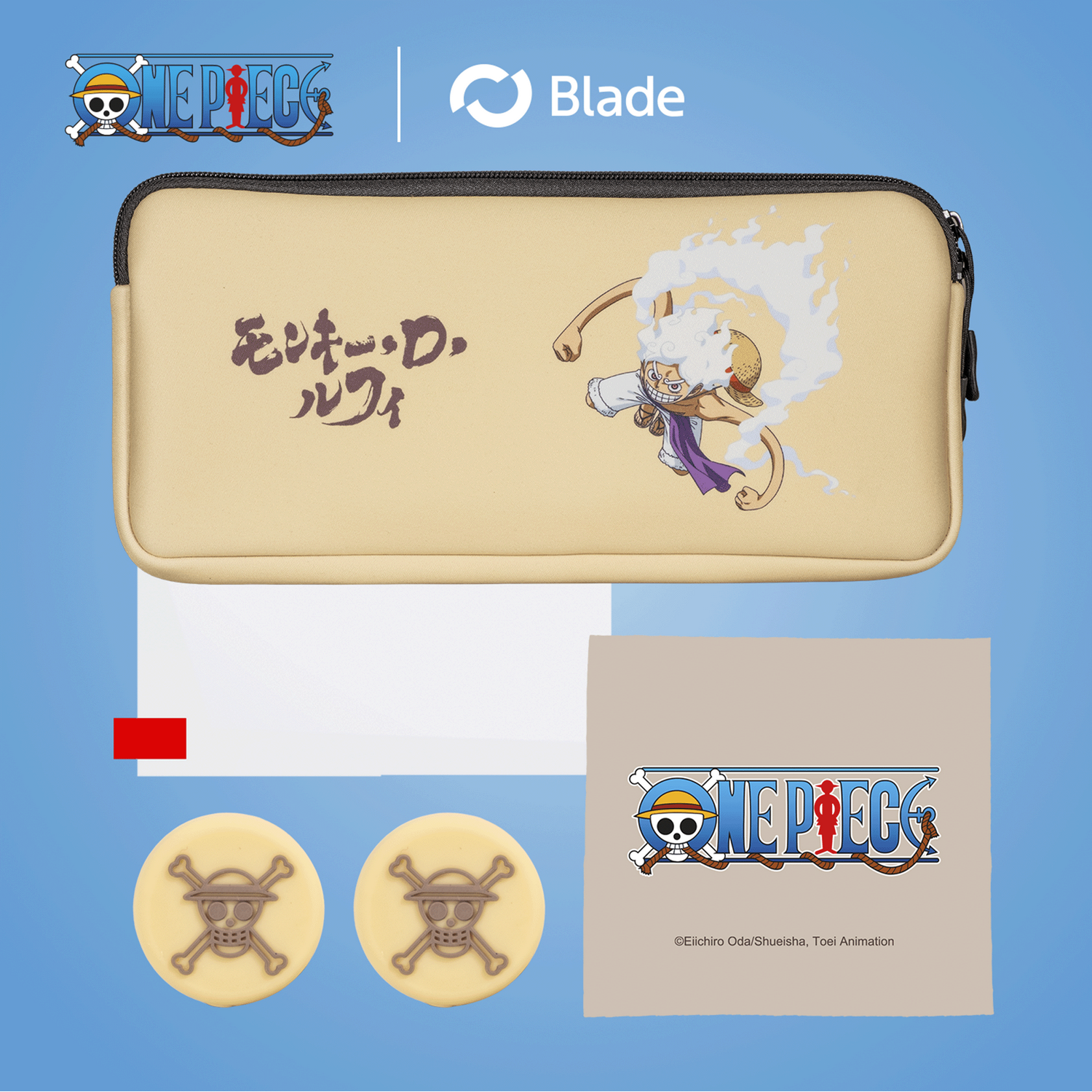 Estuche con una ilustración de Luffy de One Piece. Abajo, dos galletas de calaveras y un logo de One Piece sobre fondo beige.