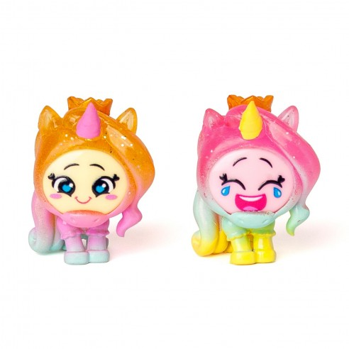 Dos figuras con tema de unicornio. Una es dorada, la otra rosa. Ambas tienen coronas y caras sonrientes. Están sobre un fondo blanco.