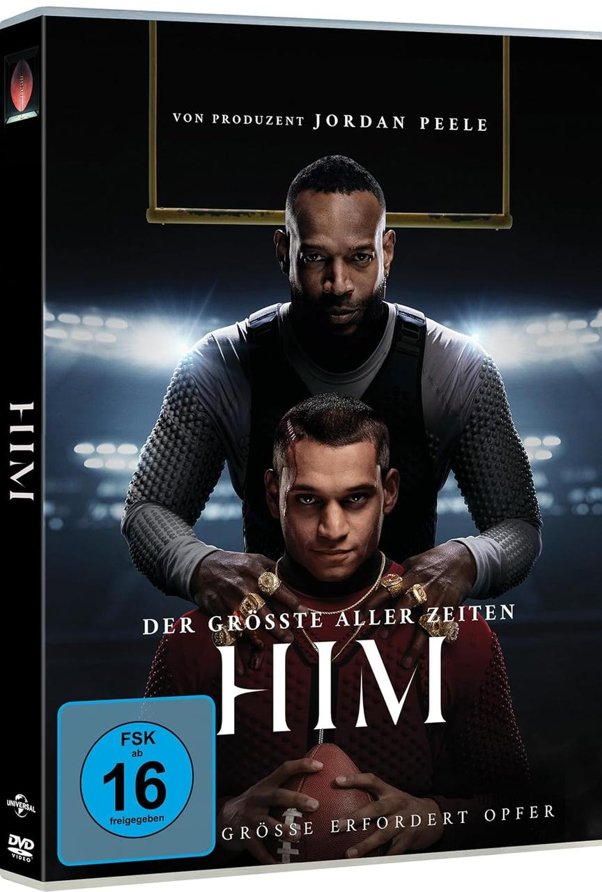 DVD-Cover mit zwei Männern. Einer, dahinter, hat die Hände auf den Schultern des anderen. Titel: HIM. Text: Der Größte Aller Zeiten.