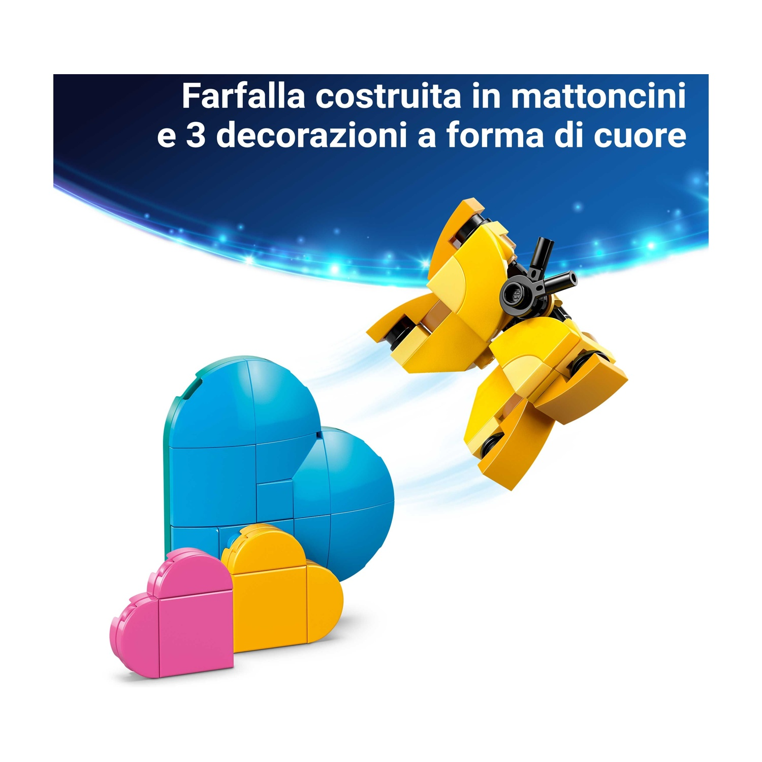 Una farfalla gialla fatta di blocchi con 3 decorazioni a cuore. Cuori rosa, gialli e blu in primo piano.