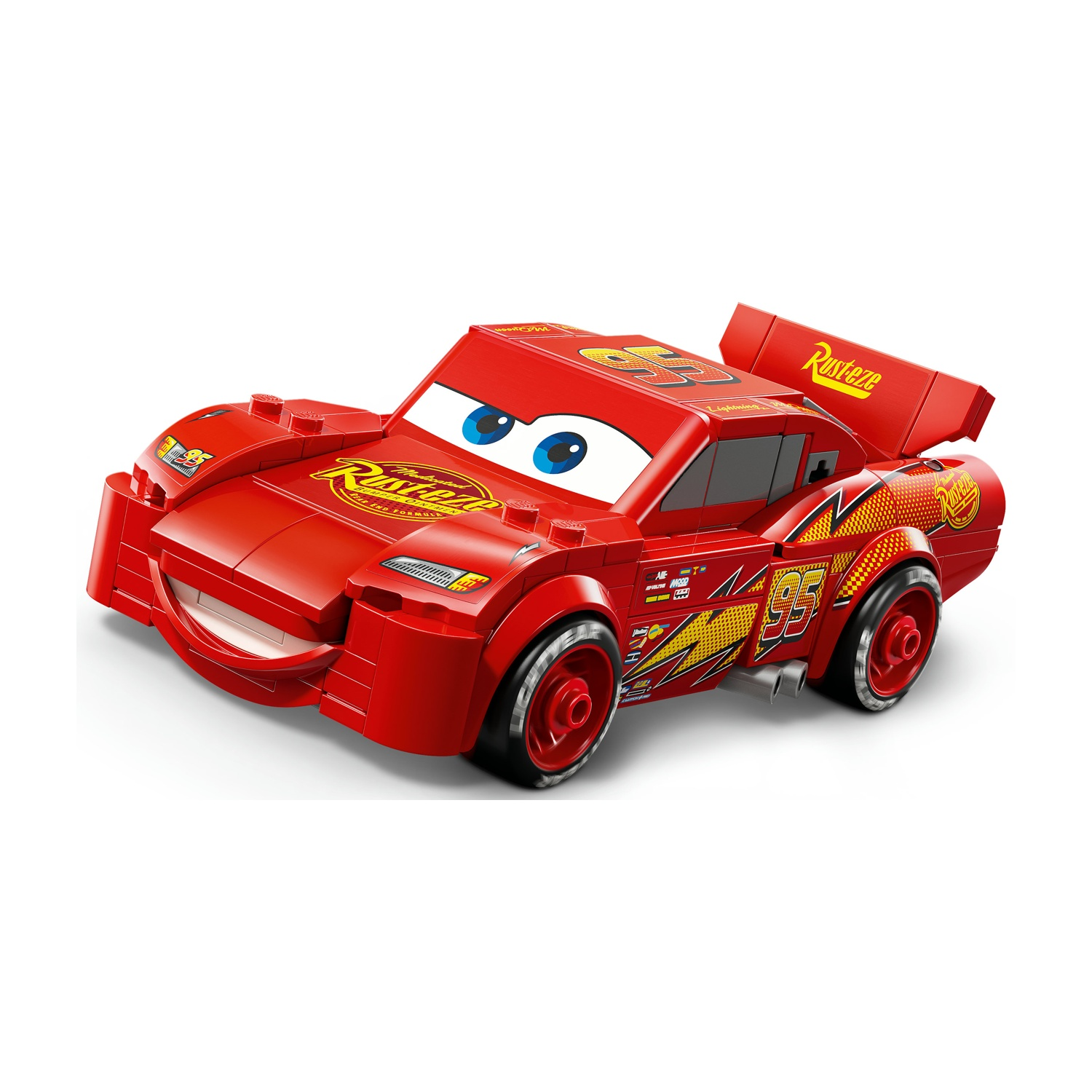 Un'auto giocattolo rossa, Saetta McQueen, del film Cars. Ha occhi blu, un grande sorriso e i loghi 'Rusteze' e '95'.