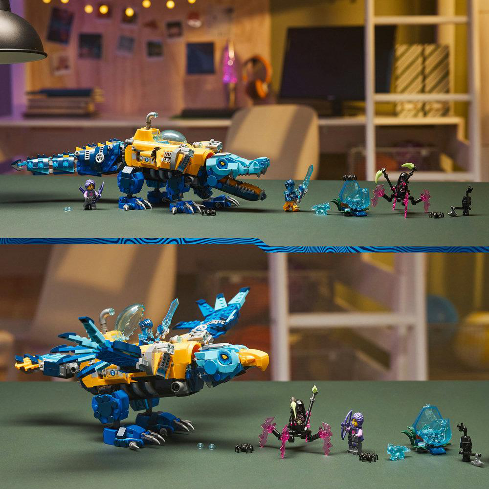 Zwei Lego-Bauten: ein blau/gelber Drache und Vogel. Kleine Figuren und Kristallelemente sind ebenfalls auf einer grünen Oberfläche vorhanden.