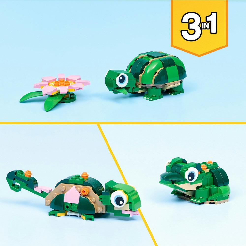 Das Bild zeigt drei Lego-Tierkreationen: eine Schildkröte, eine Blume und einen Frosch. Der Hintergrund ist blau, mit einem gelben 3-in-1-Schild.
