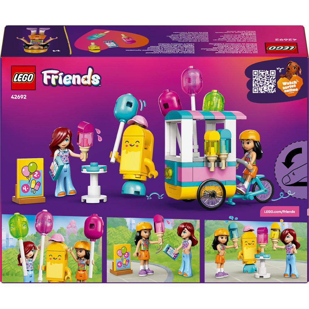 Lego Friends-Set-Box. Enthält Lego-Figuren mit Eis und einem Wagen. Enthält ein Mädchen auf einem Fahrrad und eine gelbe lächelnde Figur.