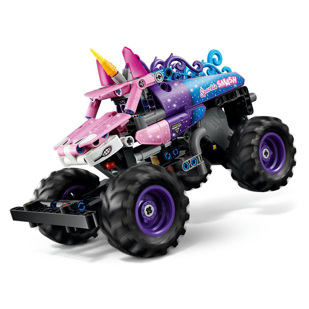 Ein pinkfarbener und lila Lego-Monstertruck mit Einhornhorn und großen Rädern. Es steht 'Sparkle Smash'.