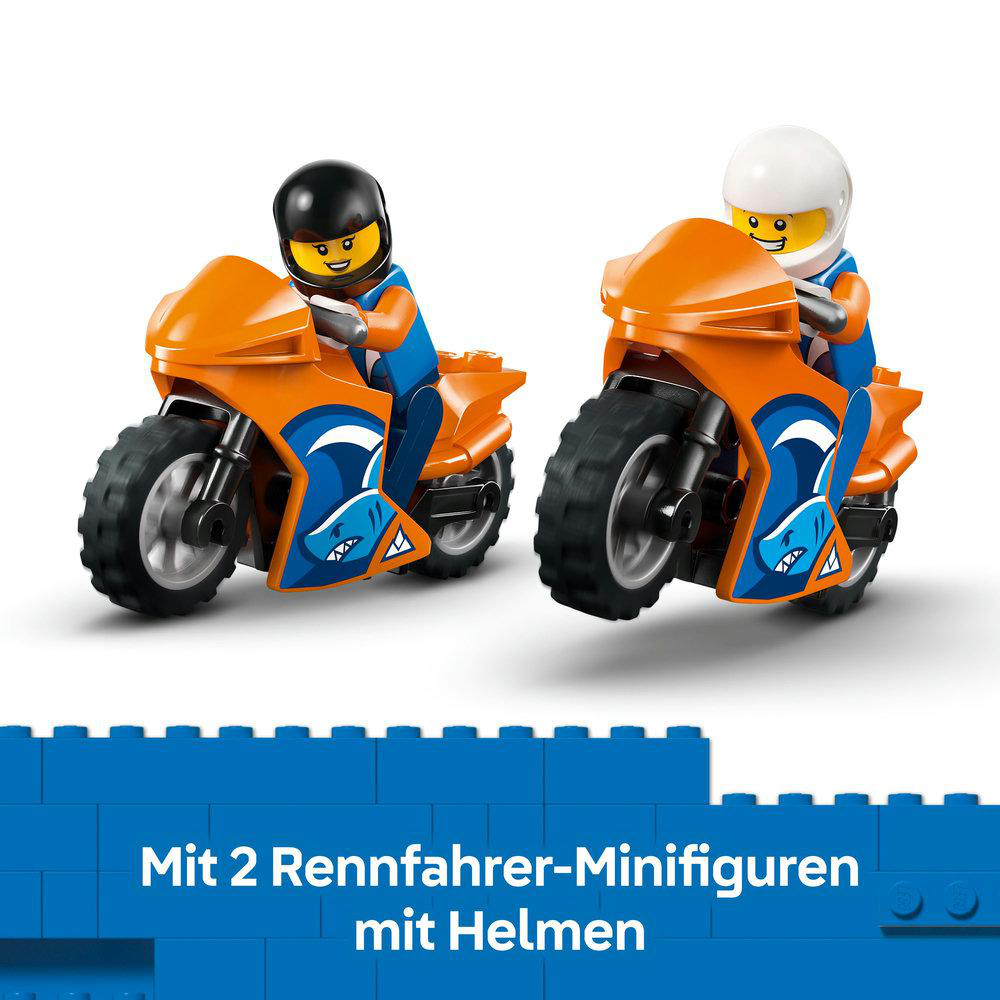 Zwei Lego-Rennräder mit Fahrern. Ein Fahrer trägt einen schwarzen Helm, der andere einen weißen Helm. Beide Räder sind orange und blau.