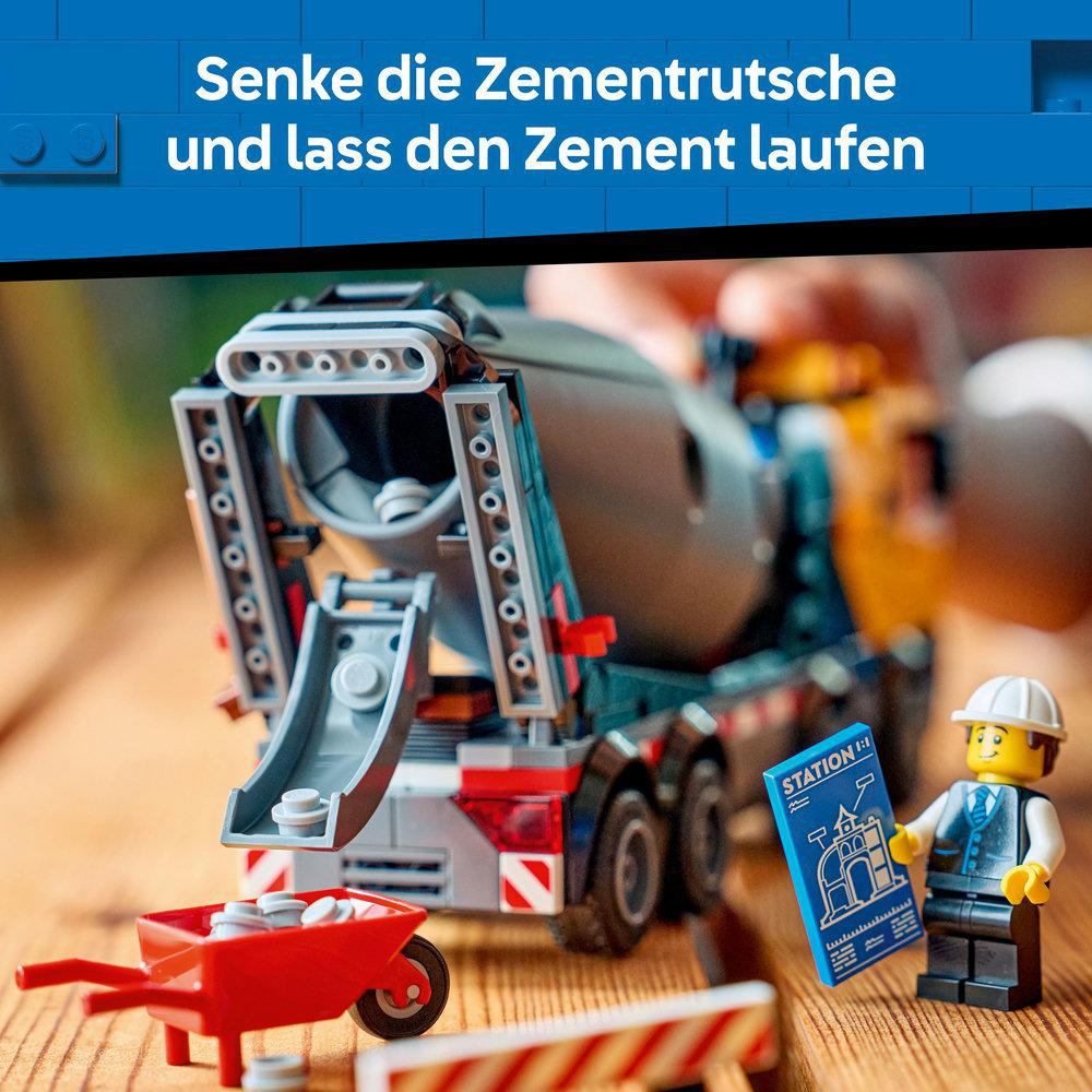 Ein Lego-Zementmischer mit einem roten Schubkarren und einer Bauarbeiterfigur, die einen Bauplan hält.