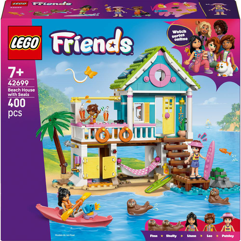 LEGO Friends Strandhaus mit Robben. Es beinhaltet ein Haus mit rosa Tür, ein Mädchen mit Surfbrett und ein Boot.
